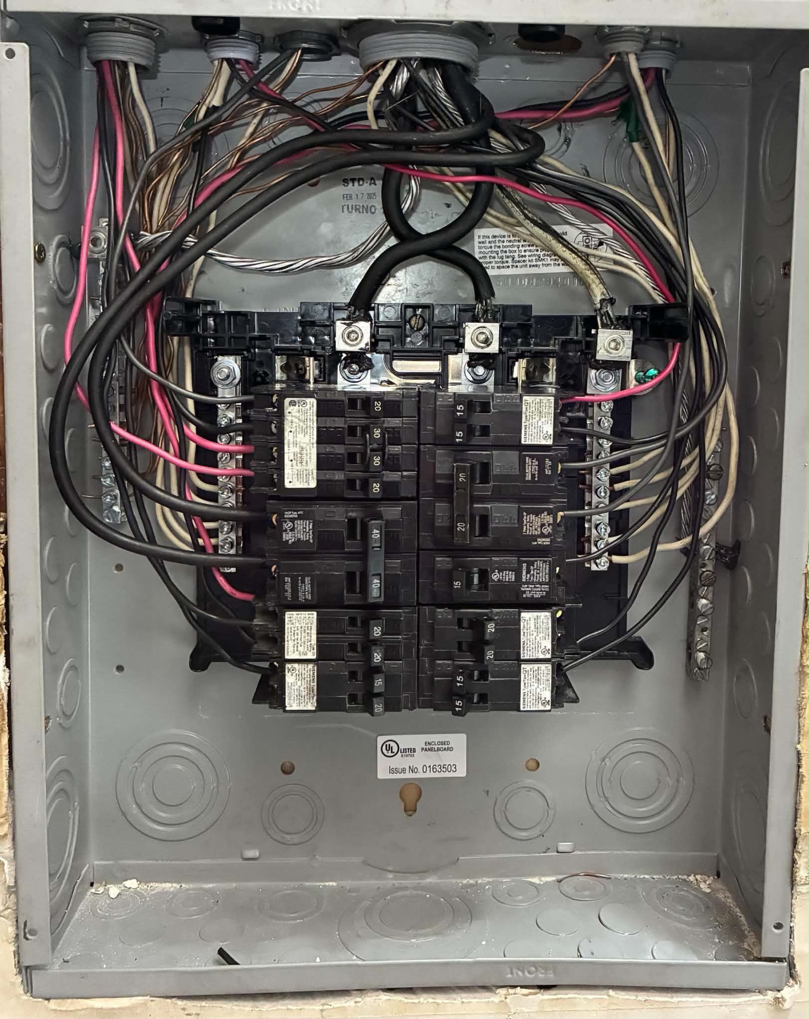 Residential electrician completing a subpanel installation for a Vacaville home