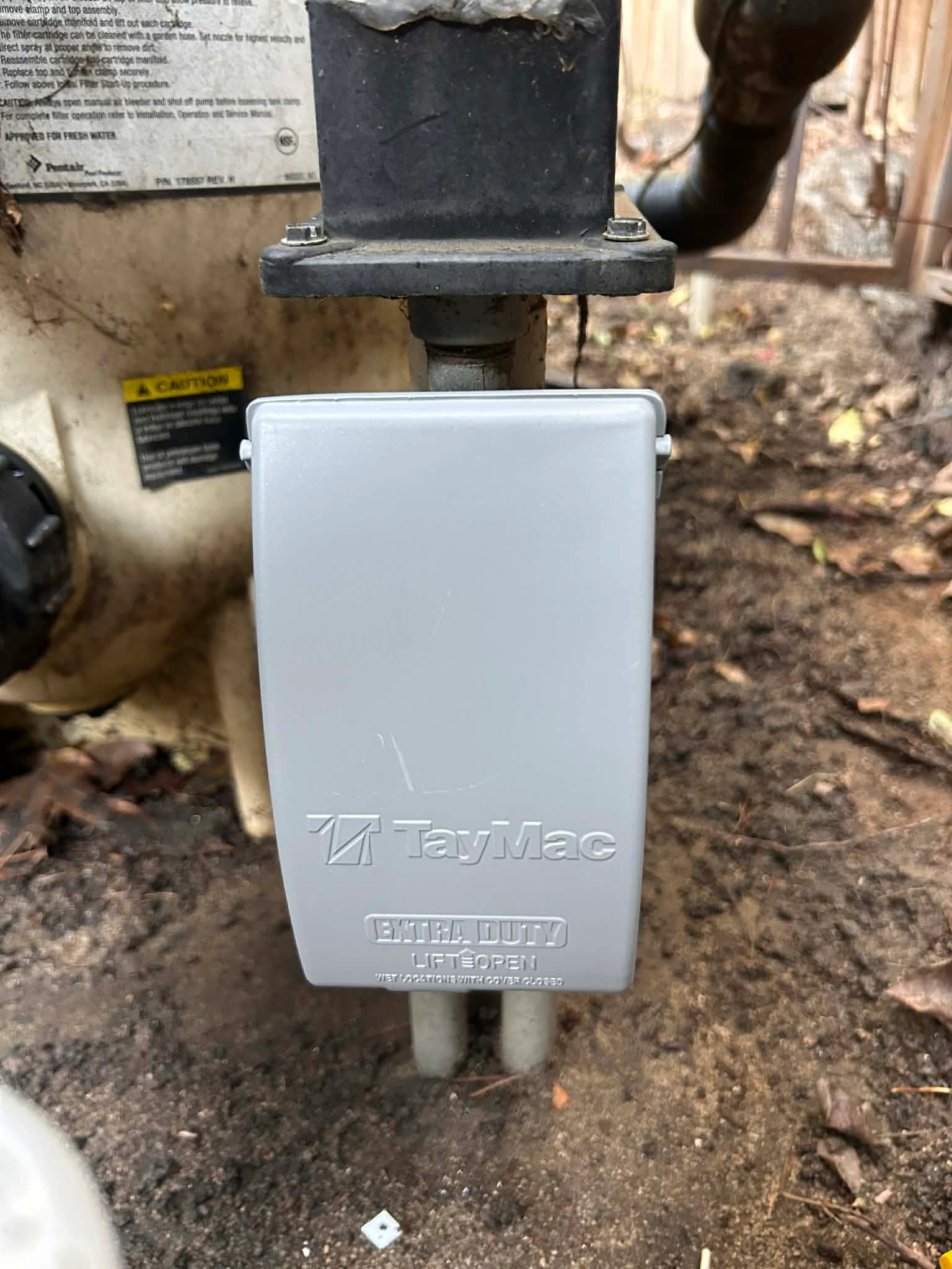 Outdoor residential electrical outlet inspected during troubleshooting