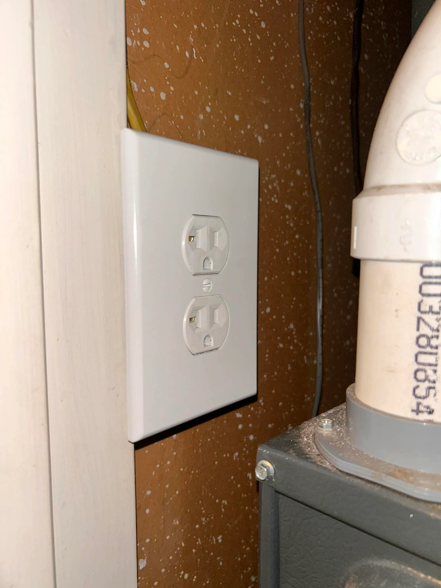 Residential outlet inspected during electrical troubleshooting in an older home
